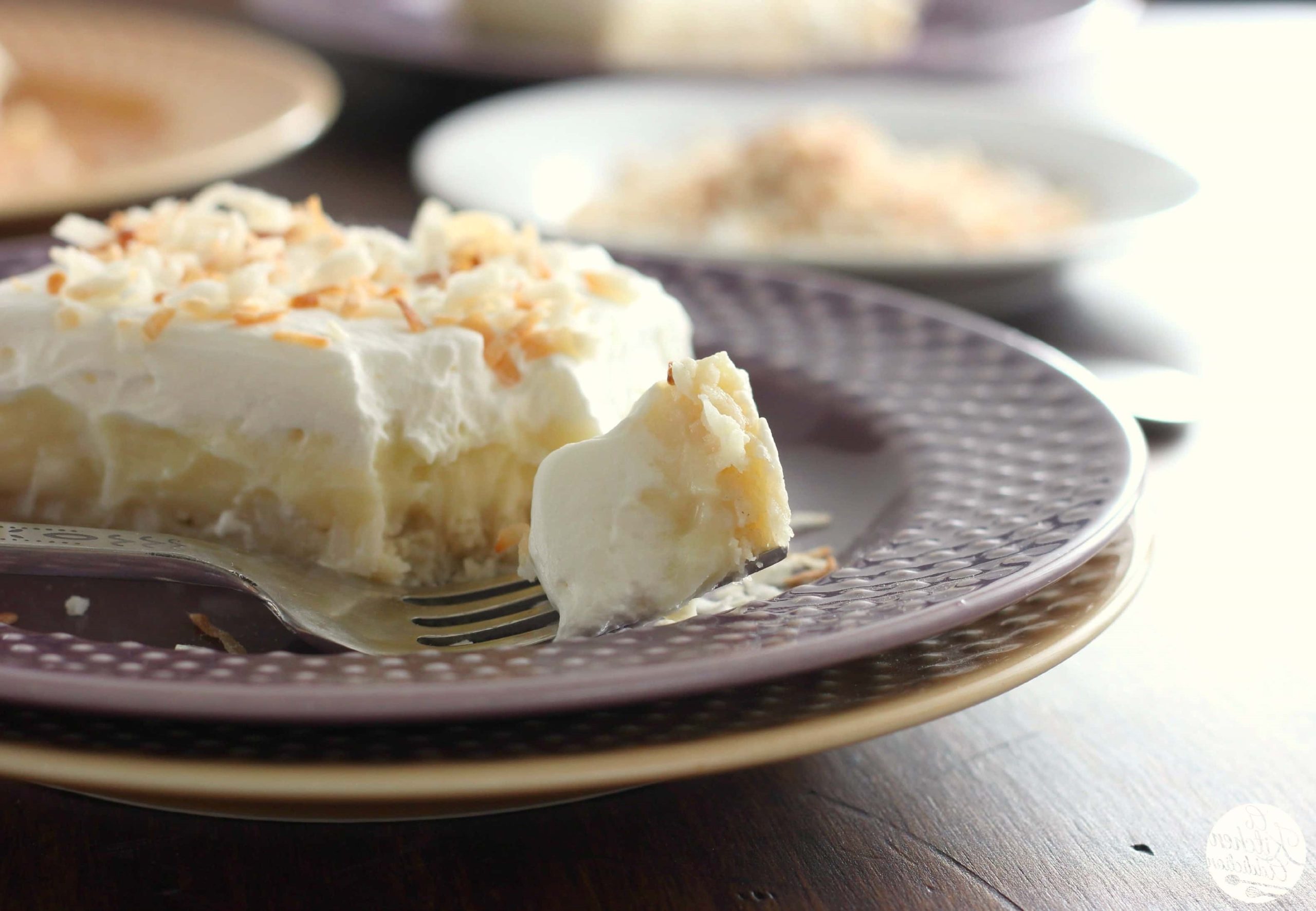 Classic coconut cream bars: a heavenly mix of graham cracker crust, creamy coconut filling, and pure bliss