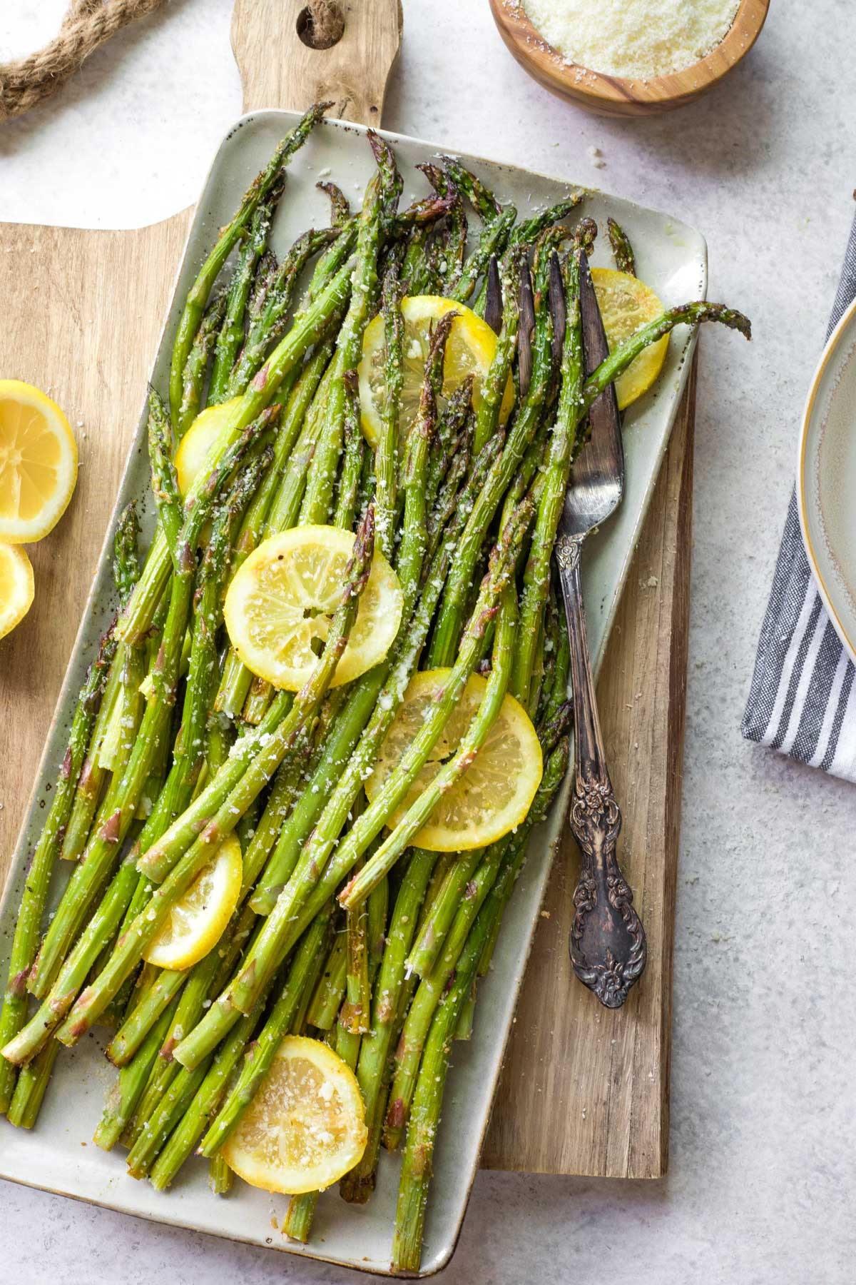 Serve grilled asparagus hot with lemon, sauces, herbs, or nuts for extra flavor!