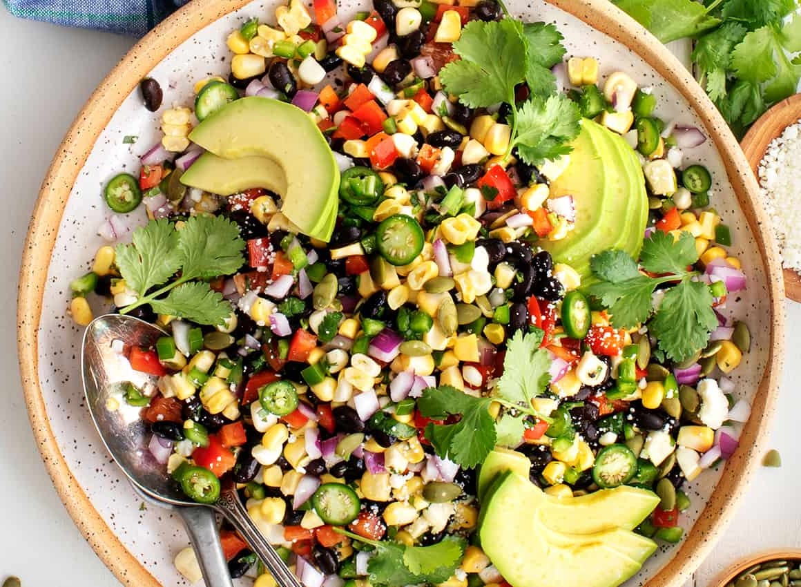 The classic black bean and corn salad is your blank canvas – add southwestern spices, Mediterranean flavors, or Asian flair!