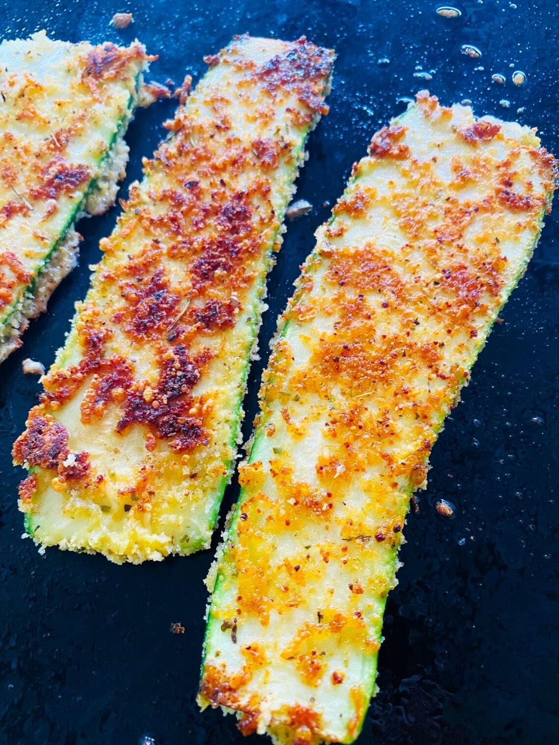 This recipe transforms bland zucchini into a crispy, flavorful side dish (or main!) with a secret weapon: breadcrumbs