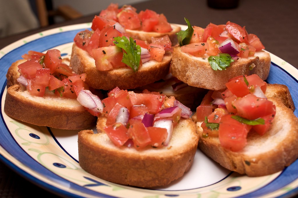 Bruschetta is a versatile, crowd-pleasing appetizer with a symphony of flavors and textures