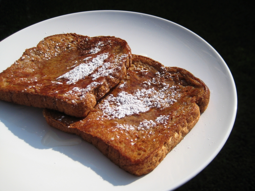 Whisk the batter, soak the bread, and cook until golden brown on both sides for the perfect vegan French toast