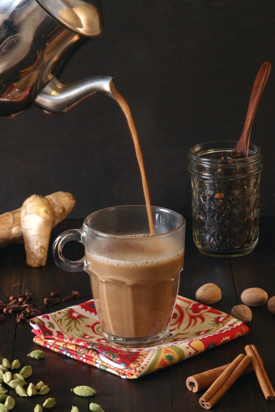 Crush spices, simmer in water, add tea, then milk, and voilà – your fragrant chai awaits!