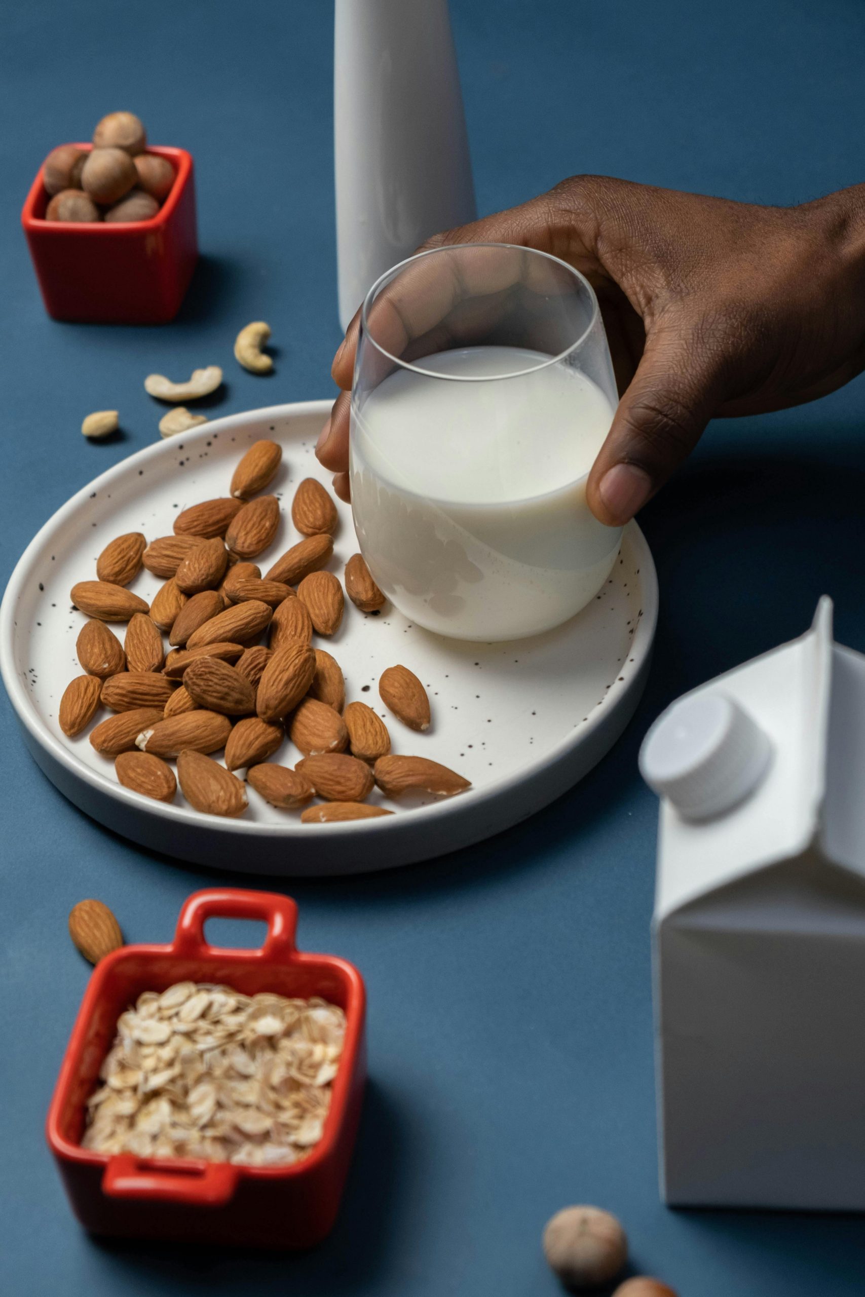 Gather raw almonds, filtered water, optional flavorings, a blender, and a nut milk bag or strainer